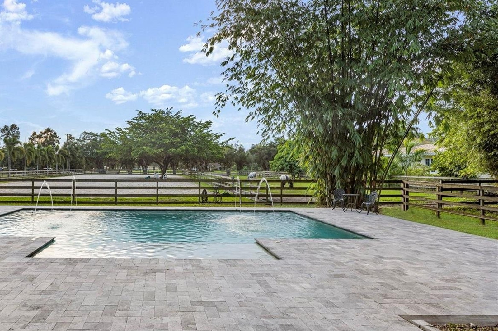 A Southwest Ranches pool and pasture sold by Team Hsu