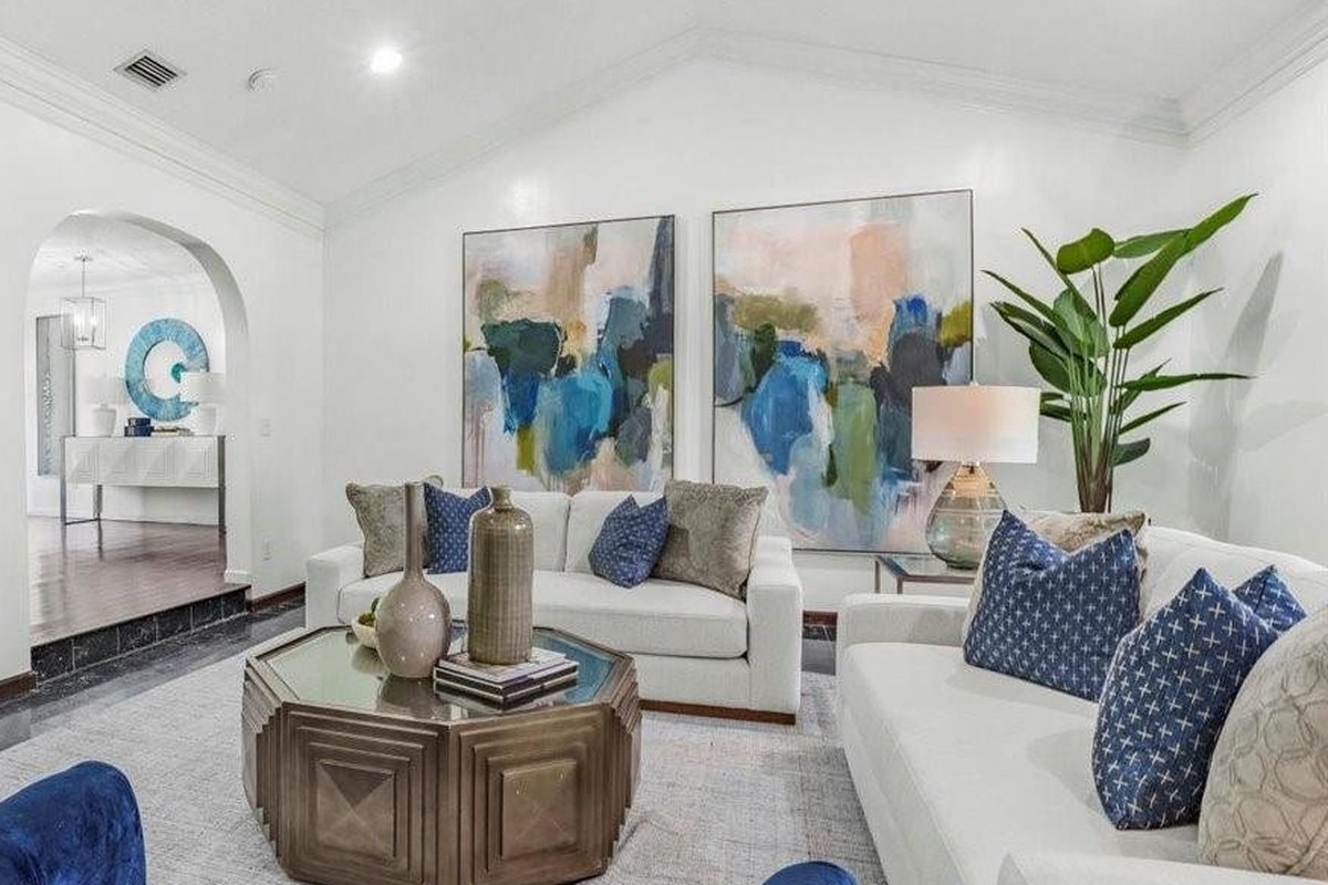 A bright South Florida living room in a home Team Hsu sold